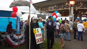 Aug. 12, 2016 Grim reaper with flag at Hillary tent